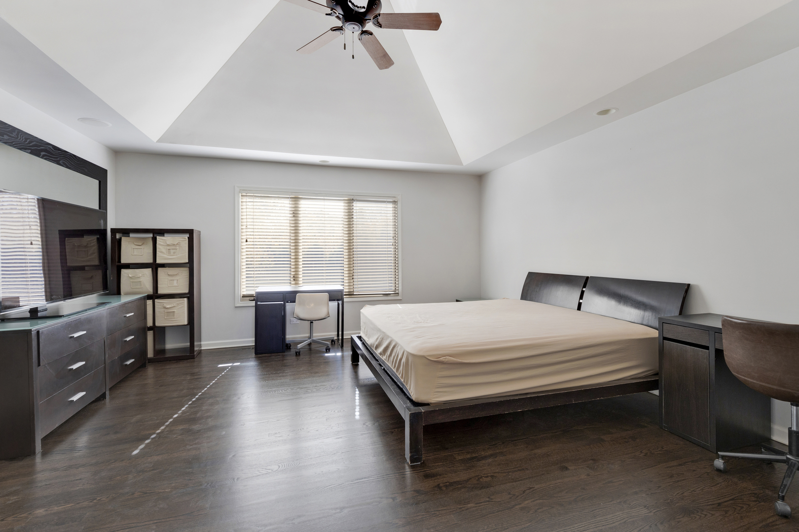 4469 Kettering Drive Long Grove, IL 60047 - Photo 16 of 45 a bedroom with a bed and a dresser next to a window