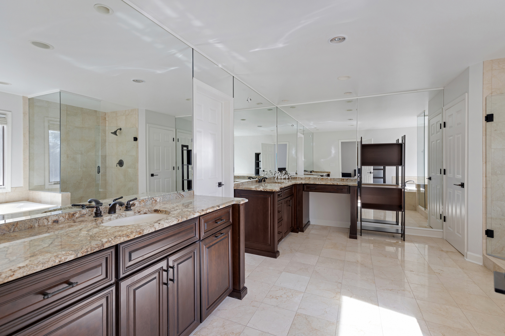 4469 Kettering Drive Long Grove, IL 60047 - Photo 18 of 45 a spacious bathroom with a granite countertop sink mirror and double