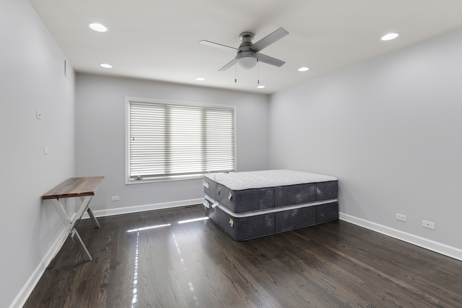 4469 Kettering Drive Long Grove, IL 60047 - Photo 27 of 45 an empty room with wooden floor and windows