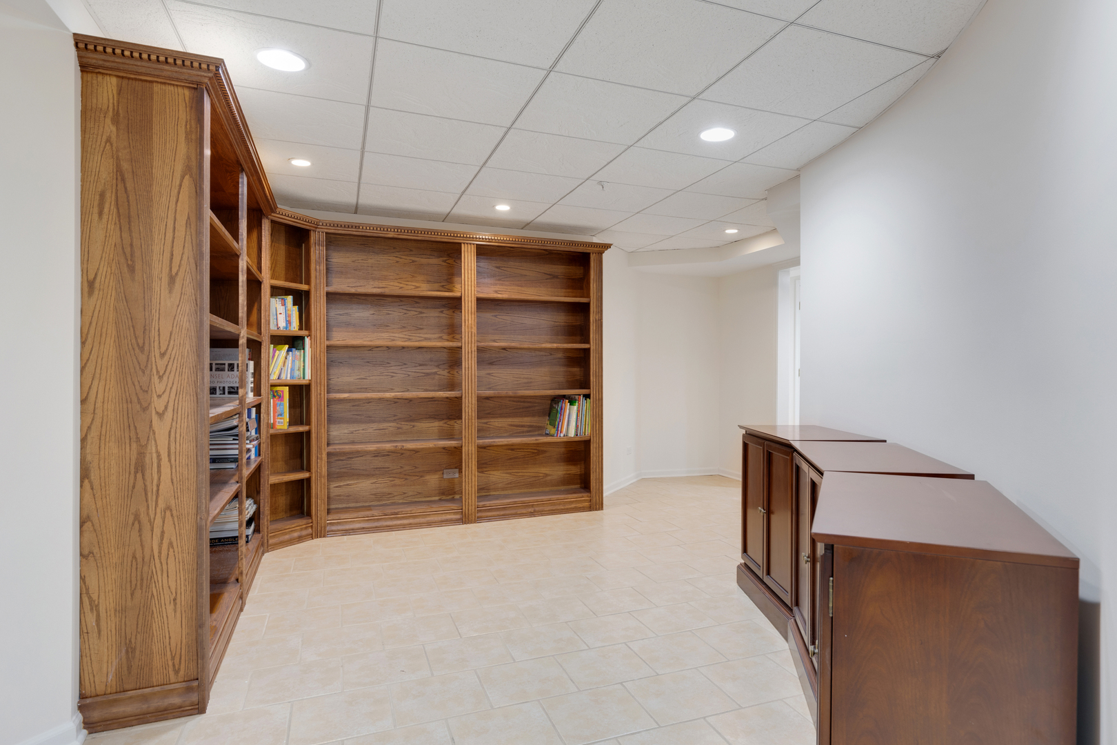 4469 Kettering Drive Long Grove, IL 60047 - Photo 34 of 45 a view of an empty room with a fireplace