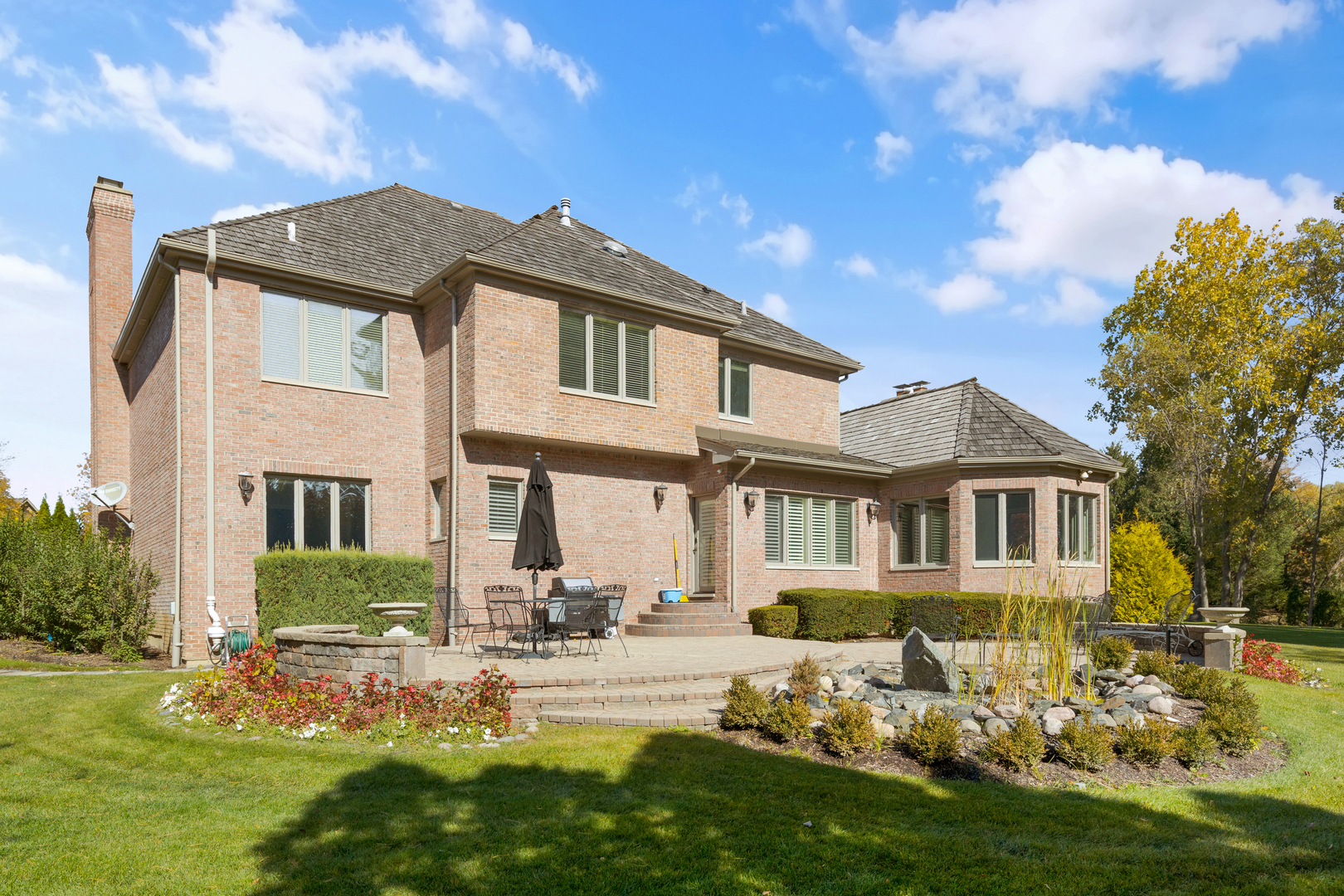 4469 Kettering Drive Long Grove, IL 60047 - Photo 37 of 45 a front view of a house with a yard