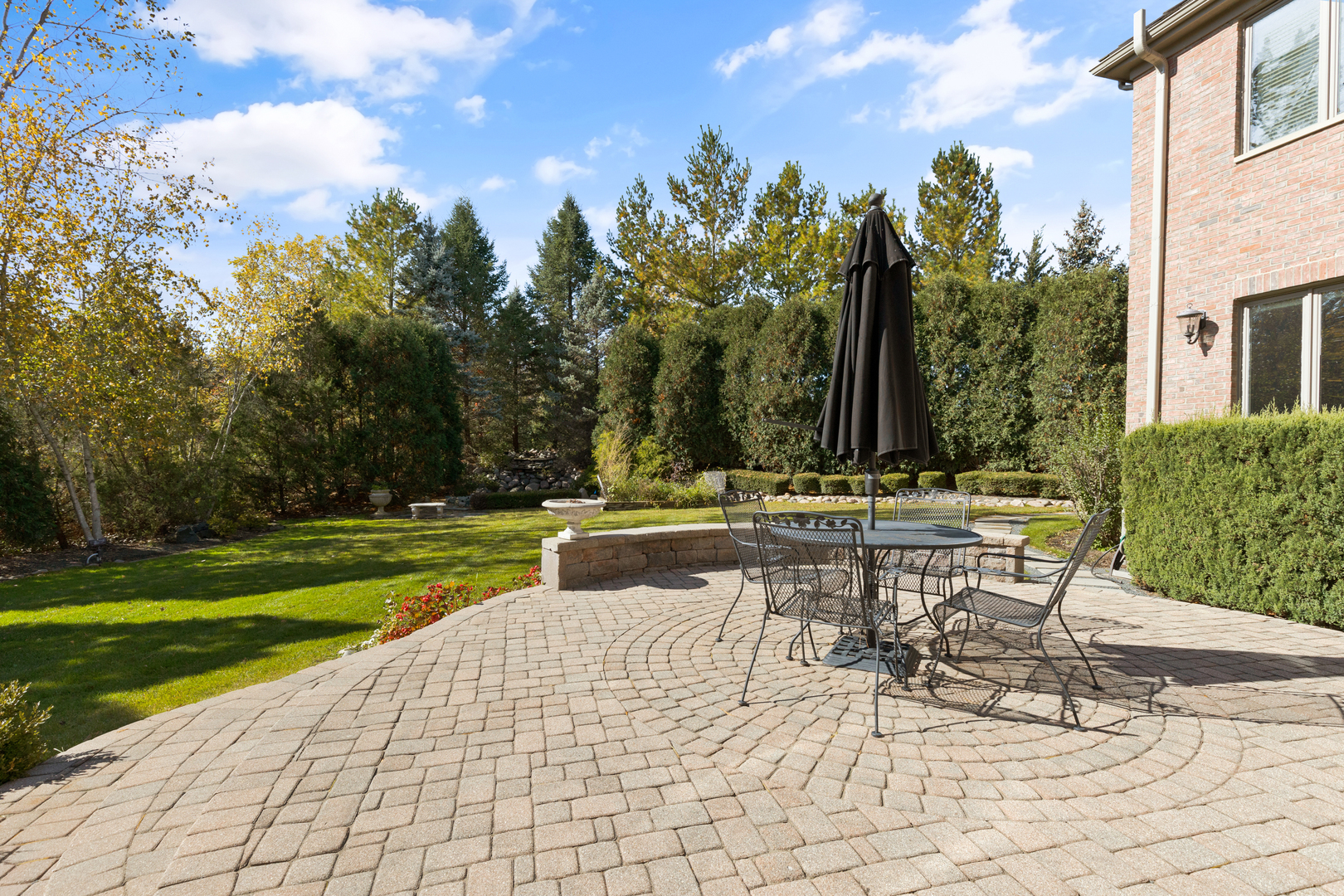 4469 Kettering Drive Long Grove, IL 60047 - Photo 38 of 45 a swimming pool with outdoor seating and yard