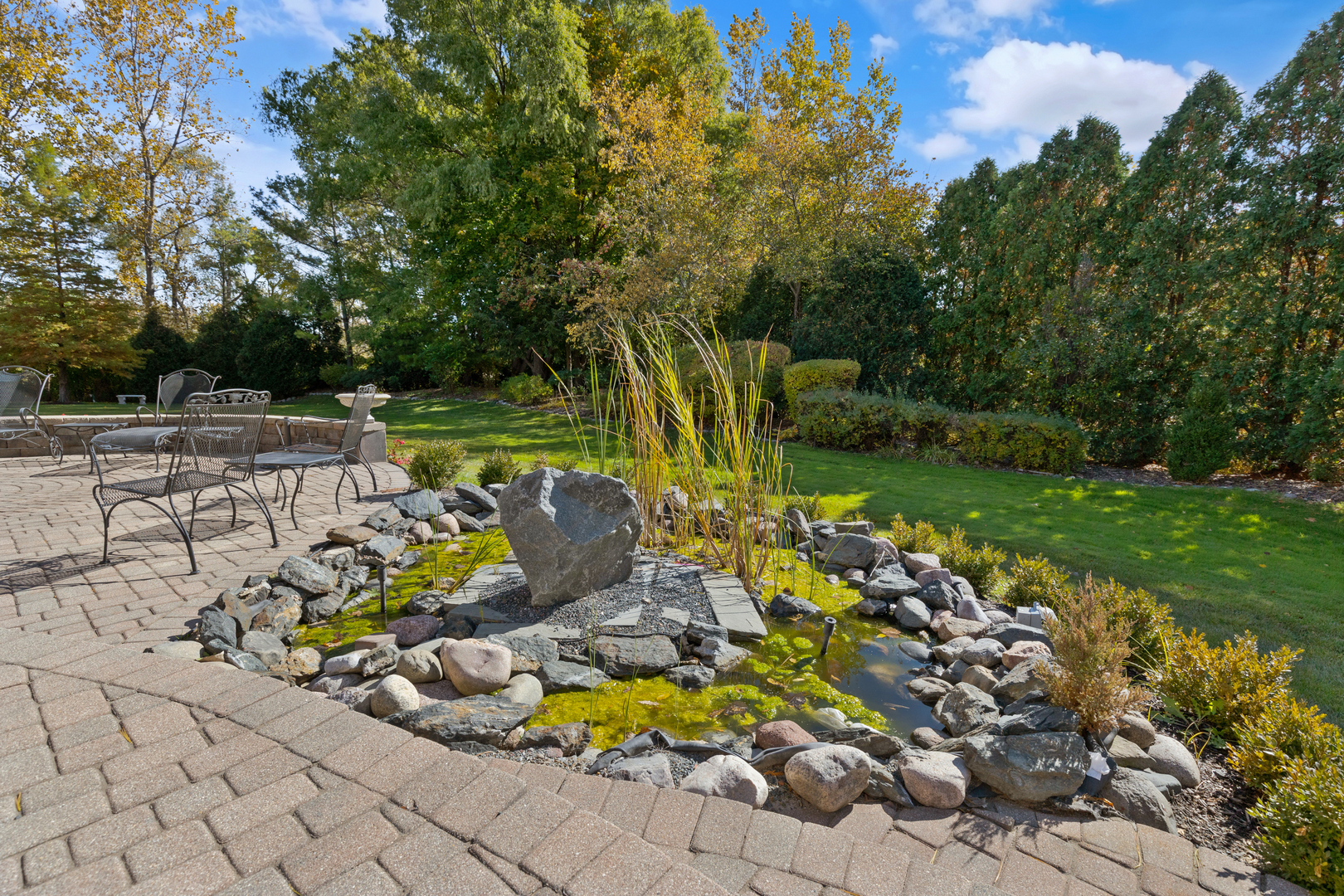 4469 Kettering Drive Long Grove, IL 60047 - Photo 40 of 45 a view of a garden with sitting area