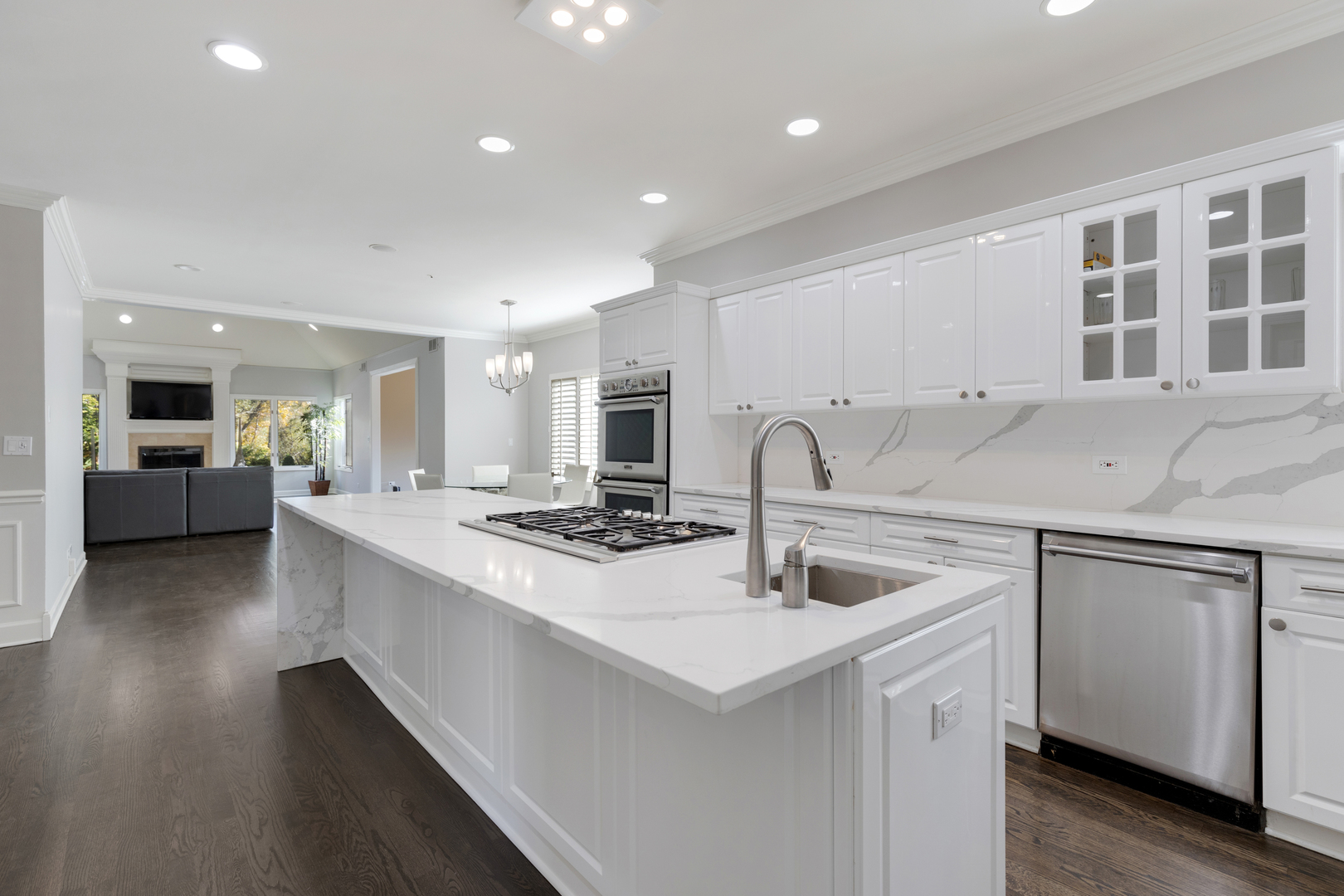 4469 Kettering Drive Long Grove, IL 60047 - Photo 6 of 45 a kitchen with stainless steel appliances granite countertop a sink stove and refrigerator
