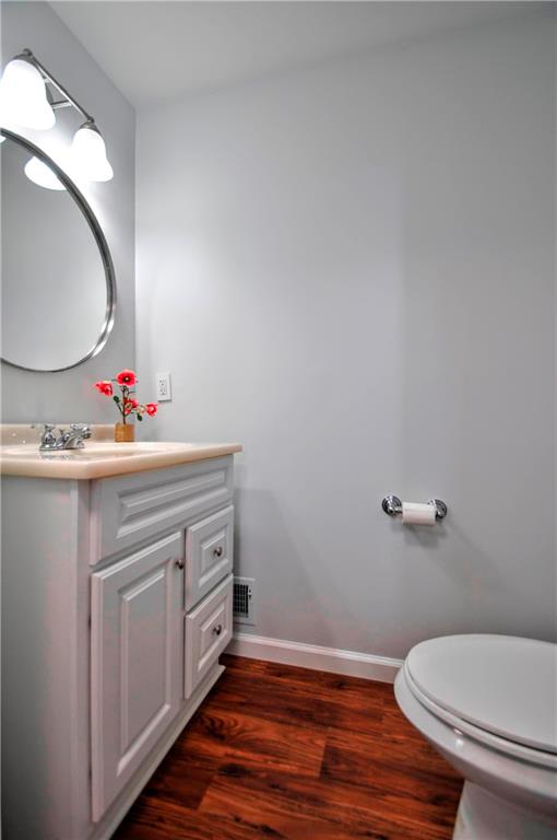 1313 Star Ridge Drive Pittsburgh, PA 15241 - Photo 28 of 36 a bathroom with a sink mirror vanity and toilet
