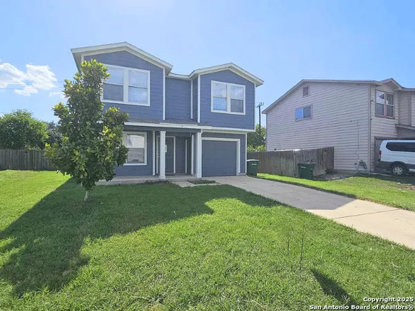 a house view with a garden space