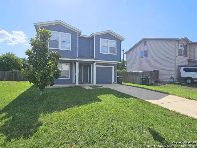 a house view with a garden space