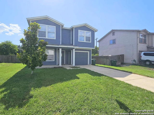 a house view with a garden space