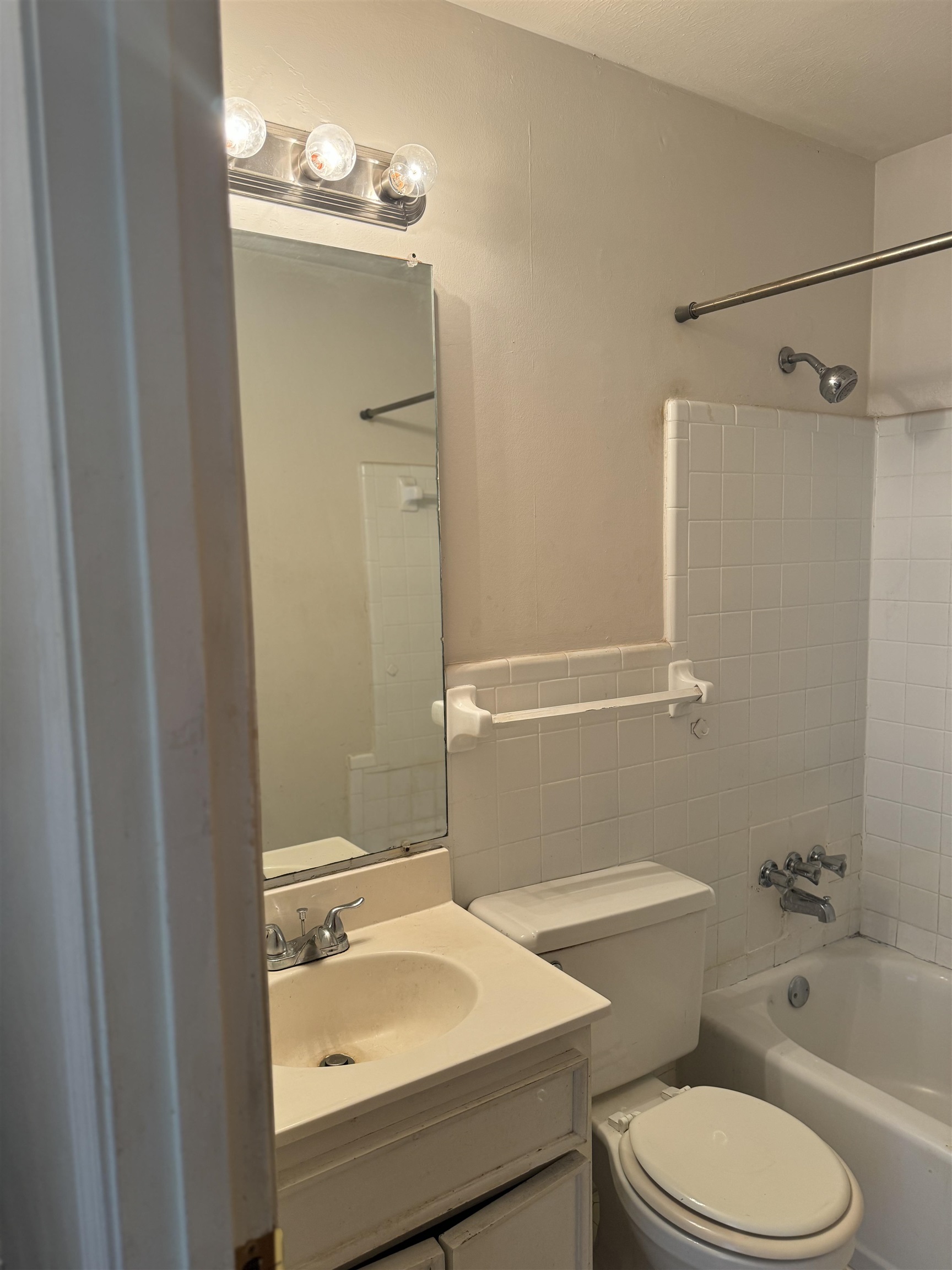 3289 Graves Road Memphis, TN 38116 - Photo 13 of 23 a bathroom with a sink toilet and shower