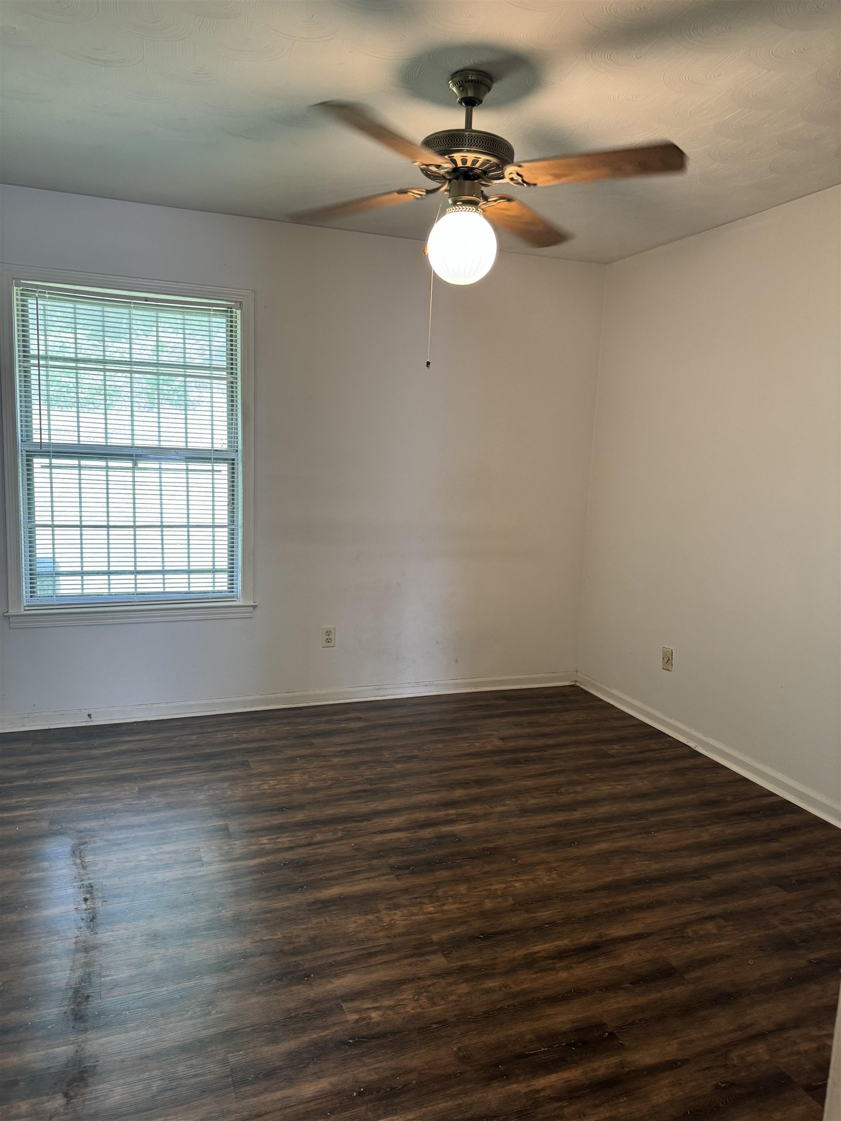 3289 Graves Road Memphis, TN 38116 - Photo 14 of 23 a view of a room with wooden floor and fan