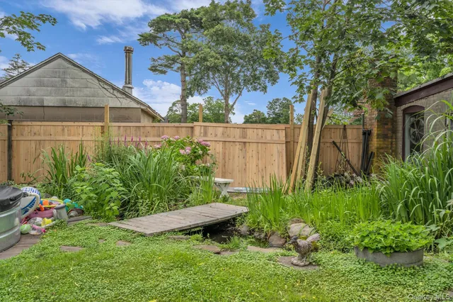 a sitting area with furniture and wooden deck