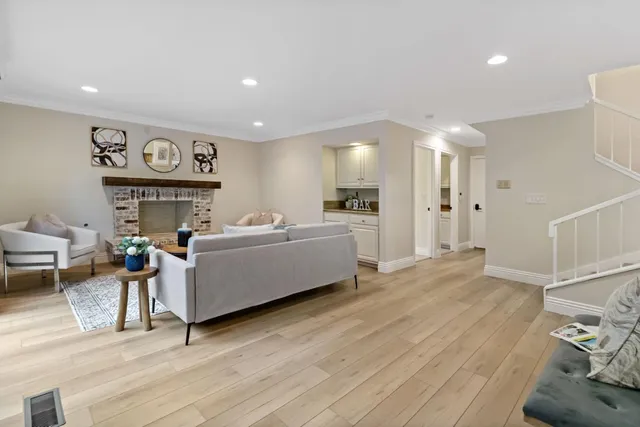a kitchen with stainless steel appliances a refrigerator and a stove