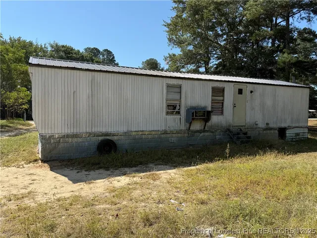 a view of a back yard of the house