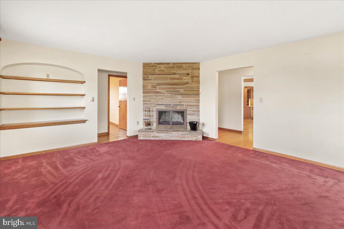 6010 Keysville Road Keymar, MD 21757 - Photo 17 of 64 a view of empty room with fireplace and window