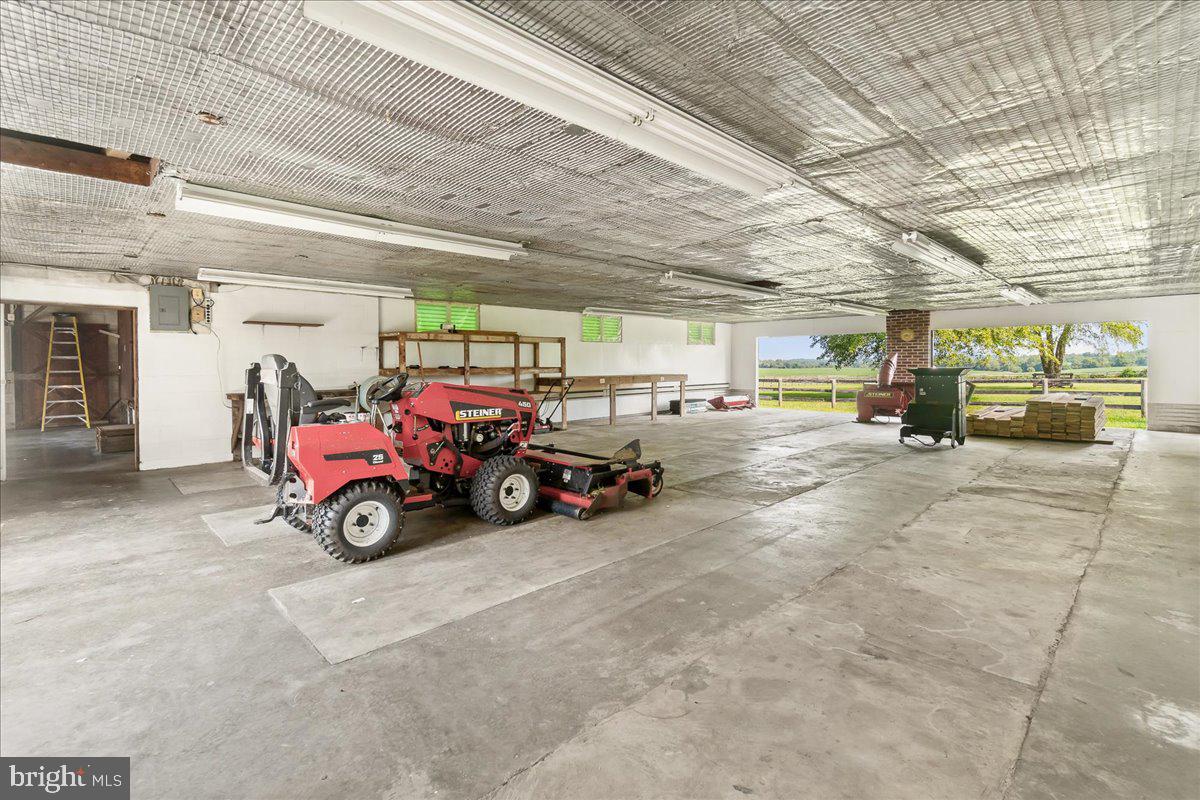 6010 Keysville Road Keymar, MD 21757 - Photo 39 of 64 a view of a garage with parked cars
