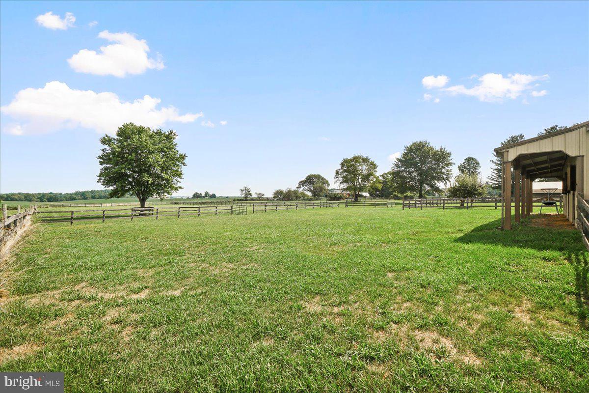 6010 Keysville Road Keymar, MD 21757 - Photo 43 of 64 a view of a golf course with a lake