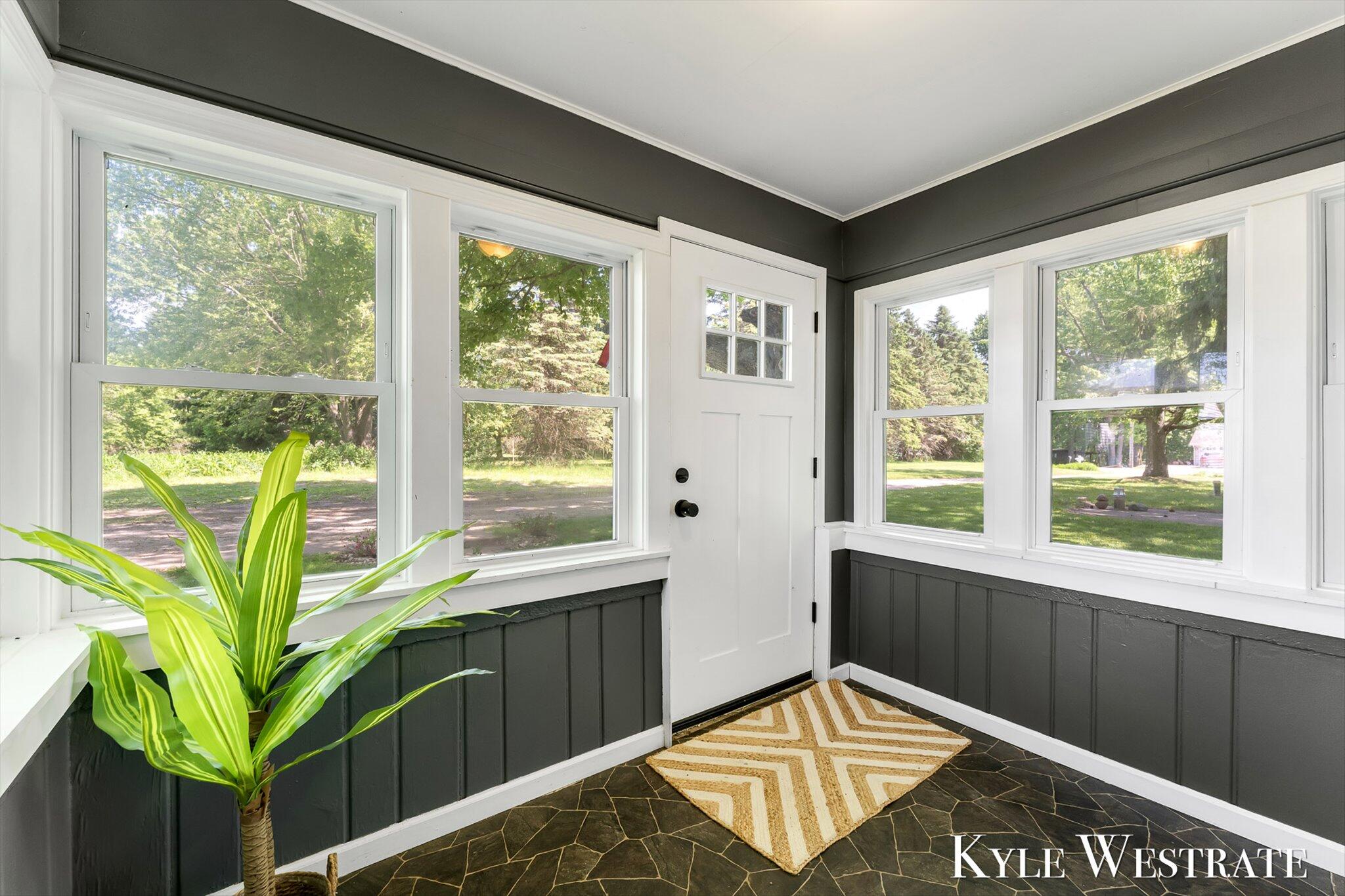 10019 10 Mile Road Northeast Rockford, MI 49341 - Photo 4 of 32 04-ELY07115