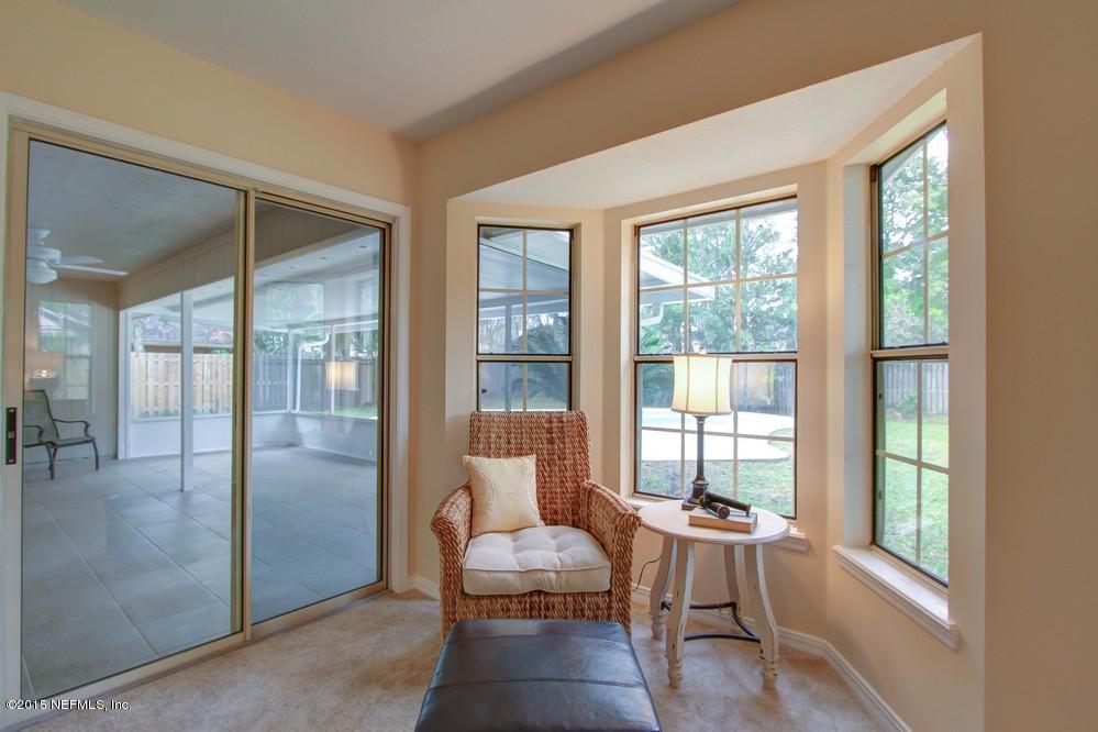 3038 Nautilus Road Middleburg, FL 32068 - Photo 17 of 45 a room with furniture and windows