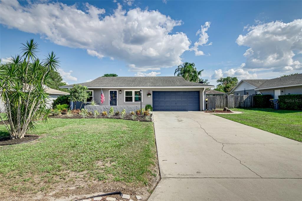 2237 Eastmeadows Road Lakeland, FL 33812 - Photo 1 of 1 a front view of house with yard and green space