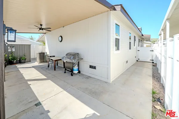 a view of a house with white walls