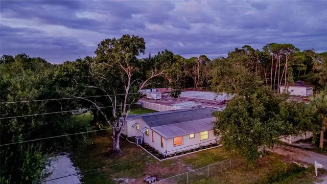 a backyard of a house with lots of green space