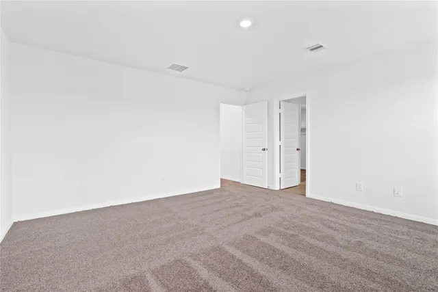 a bathroom with a tub sink double and mirror