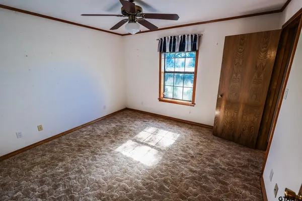 a view of a bathroom with a tub and a bathroom