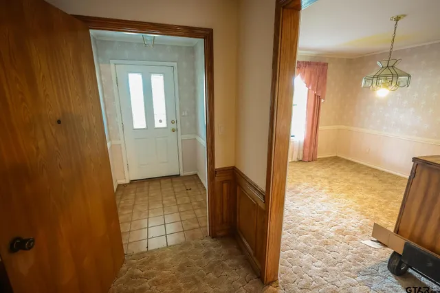 a view of a bathroom with mirror