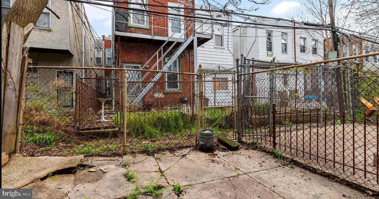 5224 Rodman Street Philadelphia, PA 19143 - Photo 12 of 12 a view of a house with a window