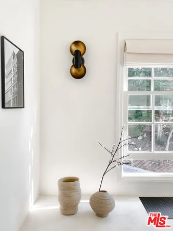 a bathroom with a sink and a window