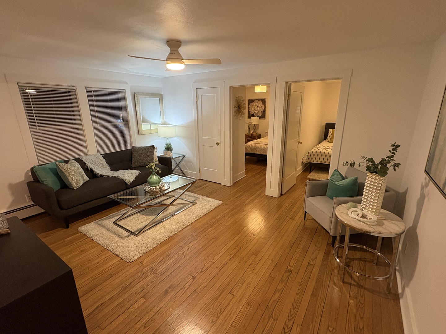 116 North 9th Street DeKalb, IL 60115 - Photo 5 of 20 a living room with furniture and a wooden floor