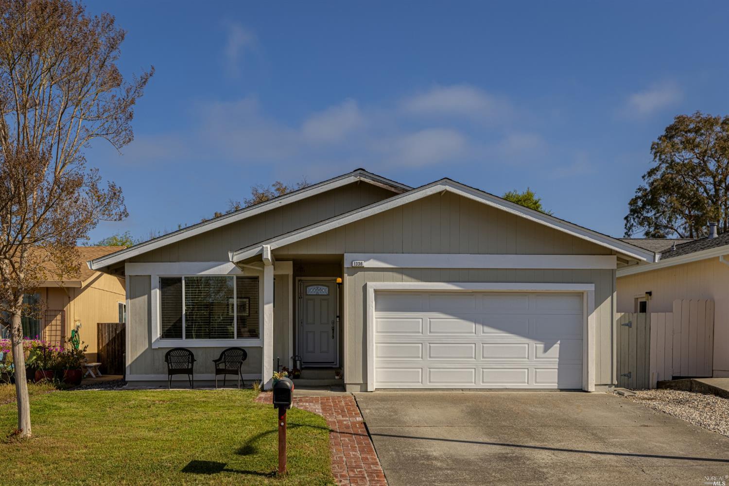 1336 Garmont Court Rohnert Park, CA 94928 - Photo 1 of 1 a front view of a house with a yard
