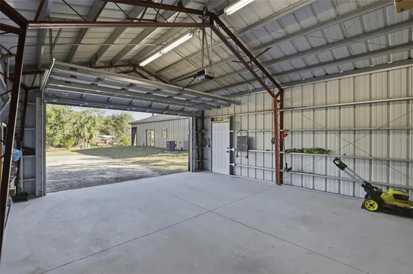 a view of a garage with furniture