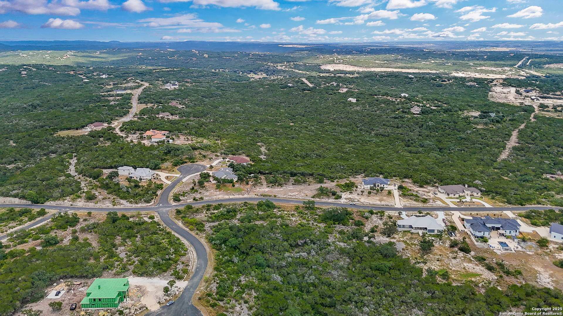 Lot 14 Pr 2771 & Pr 2773 Mico, TX 78056 - Photo 11 of 18 a view of a lake with a city