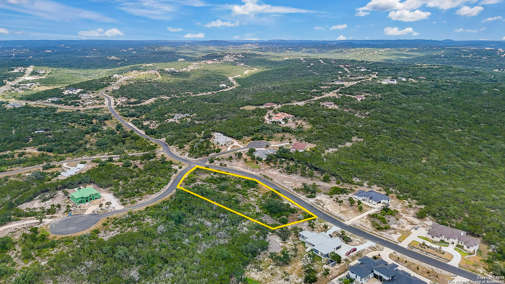 Lot 14 Pr 2771 & Pr 2773 Mico, TX 78056 - Photo 8 of 18 an aerial view of residential houses with outdoor space and trees