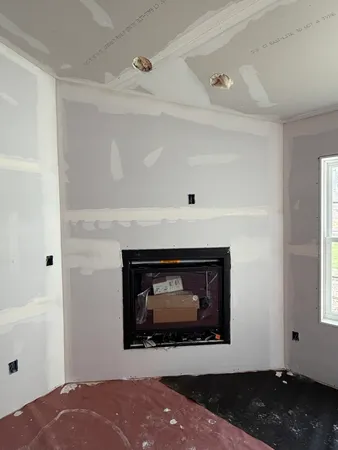 a living room with a fireplace