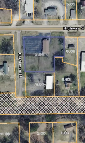 a couple of table and chairs in a parking room