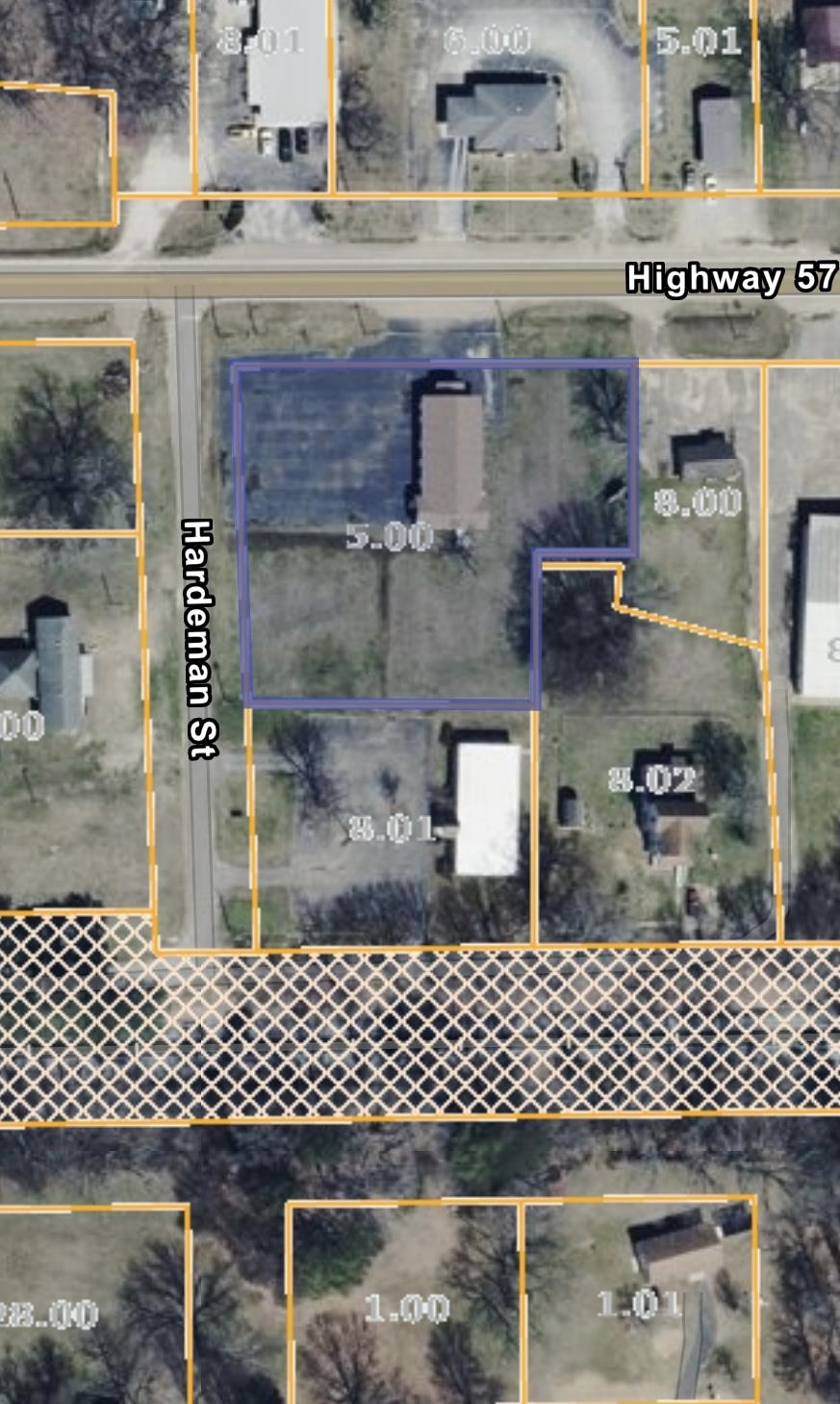 223 Highway 57 Grand Junction, TN 38039 - Photo 4 of 7 a couple of table and chairs in a parking room