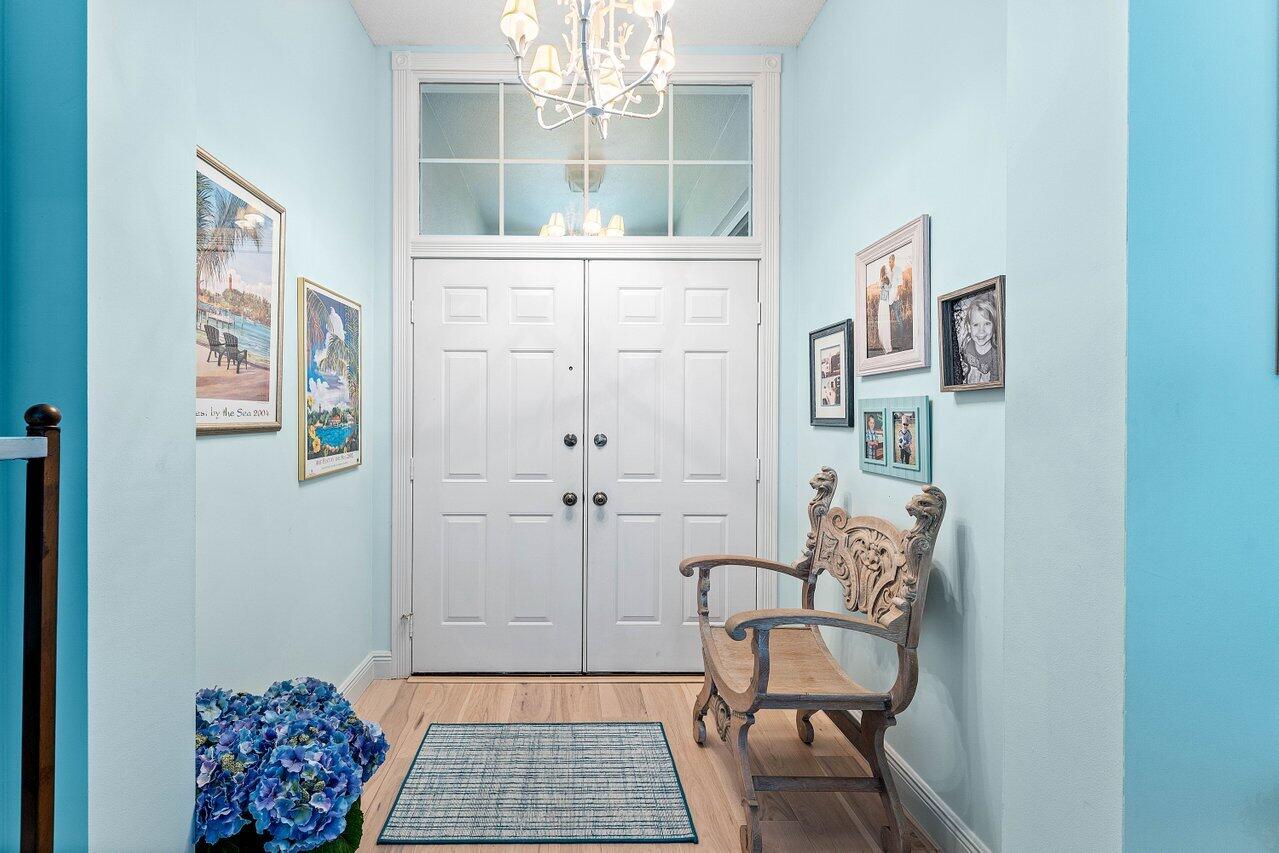198 Hampton Circle Jupiter, FL 33458 - Photo 5 of 32 a living room with furniture and a window