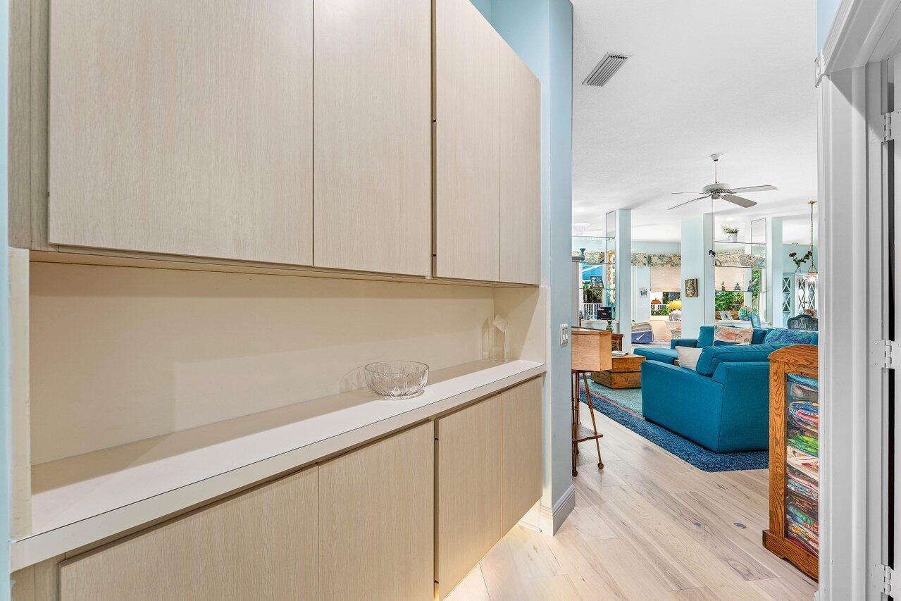 198 Hampton Circle Jupiter, FL 33458 - Photo 7 of 32 a view of kitchen with furniture and wooden floor