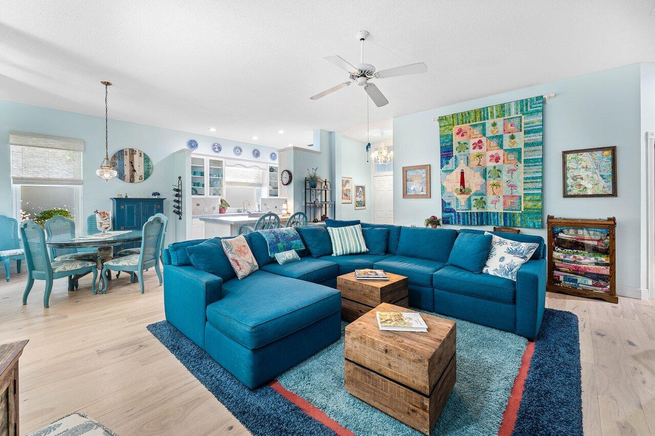 198 Hampton Circle Jupiter, FL 33458 - Photo 9 of 32 a living room with furniture and wooden floor