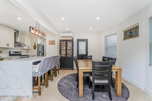 a view of a dining room with furniture