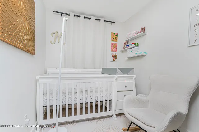 a bathroom with a sink and a window