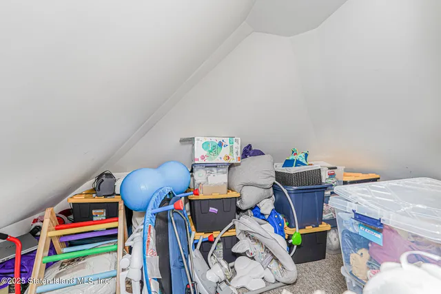 a room with toys and a wooden floor