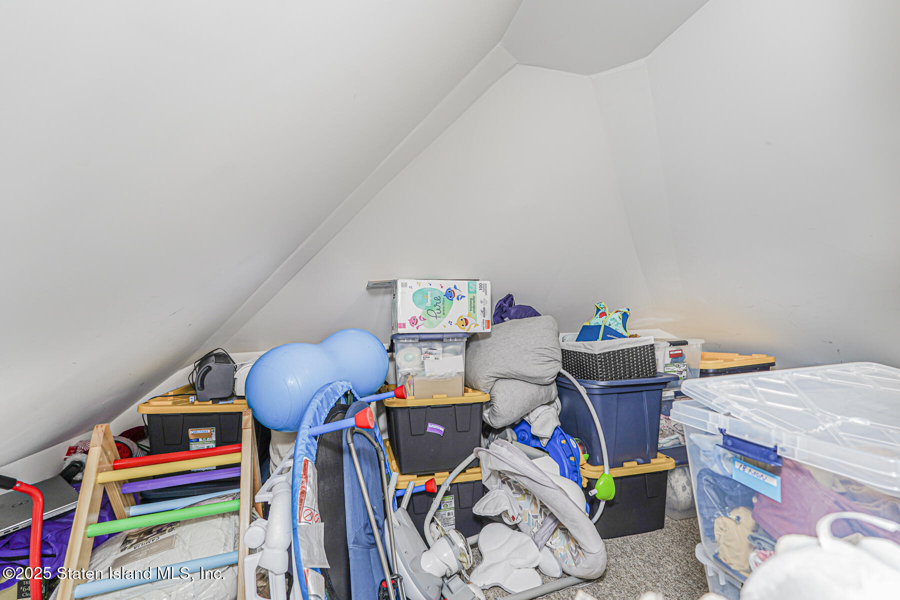 145 Clinton Place Staten Island, NY 10302 - Photo 33 of 41 a room with toys and a wooden floor