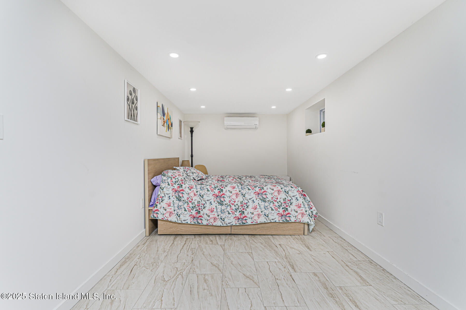 145 Clinton Place Staten Island, NY 10302 - Photo 36 of 41 a view of an empty room with wooden floor