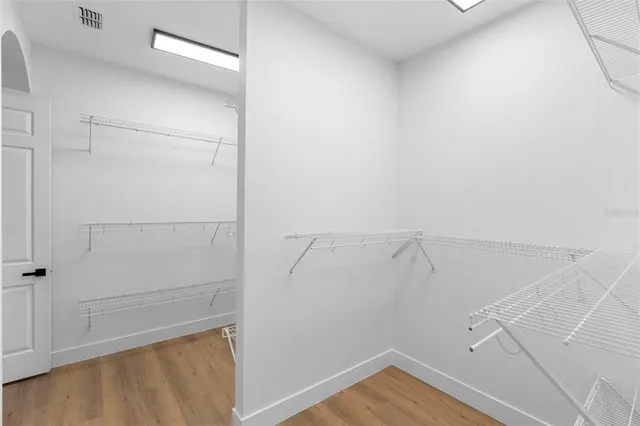 a view of a room with racks on the wall