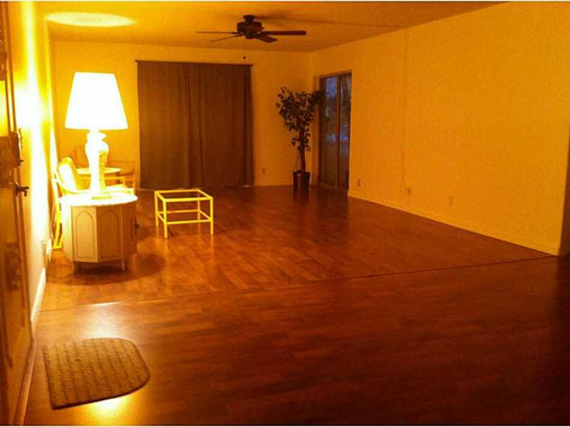 22725 Southwest 66th Avenue, Unit 101 Boca Raton, FL 33428 - Photo 2 of 10 Living Room
