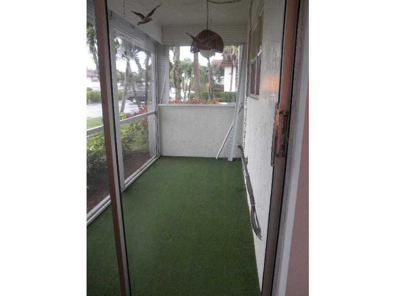 22725 Southwest 66th Avenue, Unit 101 Boca Raton, FL 33428 - Photo 10 of 10 Patio/Deck