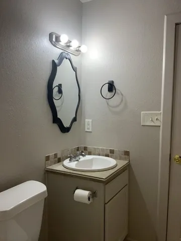 a bathroom with a shower and a bath tub